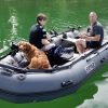 fishing on a lake in British Columbia Canada in an inflatable boat