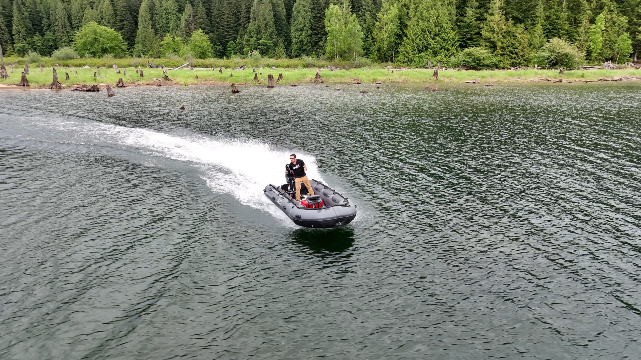 an inflatable boat out for a cruise on a lake in British Columbia Canada