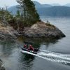 inflatable boat with bimini sunshade exploring the waters of British Columbia Canada