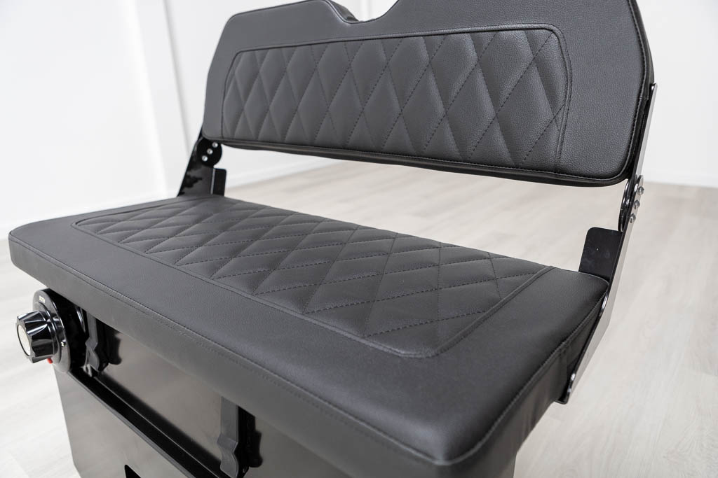 black aluminum bench for inflatable boat with upholstered cushion and folding back rest with storage inside