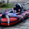 fun in a red inflatable dinghy boat