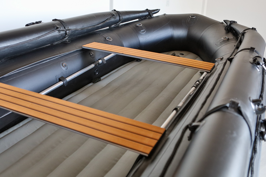 stealth black inflatable jet boat in showroom