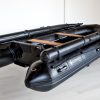 stealth black inflatable jet boat in showroom