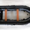 transom of stealth black inflatable jet boat with inflatable floor in showroom
